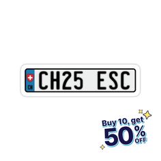 a white sticker with the words ch25 esc on it