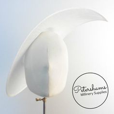 Get Royal Ascot ready with this extra large pointed tip white sinamay fascinator base! Made from a triple layer of stiffened sinamay millinery fabric and is ideal for making an instant hat. This shape has a lovely pointed tip and a shallow crown. Get creative by positioning it at different angles on the head! Just add a headband for securing to the head (not included but available in our shop!)Measurements:Length: 47cm (18.5 inches)Width (at widest point): 35cm (13.7 inches) Has a shallow crown White Sinamay Fascinator With Curved Brim, White Sinamay Fascinator For Royal Ascot, White Fitted Sinamay Fascinator, Fitted White Sinamay Fascinator, Sinamay Fascinator, Hat Base, Fascinator Hat, Royal Ascot, Fascinator Hats