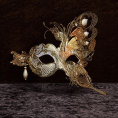 Venetian Masquerade Mask for Man or Woman - Traditional and original Venetian mask made of papier-mâché, handmade and decorated with acrylic colours, gold leaf and glitter. All our masks are handmade papier-mâché masks made in Venice. Our decorators use traditional Venetian techniques such as stucco, acrylics, gold and silver leaf, macramé, trimmings, glitters and crequelè to offer a wide range of original handmade masks and decorations This shape is available in different colors and is consider Mens Masquerade Mask, Venetian Masquerade Masks, Mask Aesthetic, Butterfly Mask, Venetian Masquerade, Half Mask, Mask Masquerade, Venetian Masks, Costume Masks