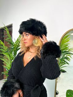 Add a little fun to your winter collection this year! The Kourt Sweater features comes in knitted fabric, maxi, relaxed silhouette, tie closure, v plunging neckline, long sleeves, and fringe tassels. Pair with our Faux Fur Cuffs, and Eleanor Bag. Model in S Polyester Machine Wash, Delicate, on Cold. Dress With Tassels, Faux Fur Hoodie, Fur Cuffs, Fur Hoodie, Pink Jumpsuit, Bag Model, Cargo Skirt, White Faux Fur, Turtle Neck Top