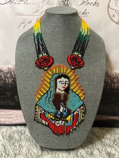 Beautiful large necklace of the Virgin of Guadalupe, handmade by Mexican artisans. The Virgin Of Guadalupe, Rainbow Choker, Waterfall Necklace, Virgin Of Guadalupe, Large Necklace, Colorful Jewelry, Beaded Necklaces, Handmade Necklace, How To Make Beads