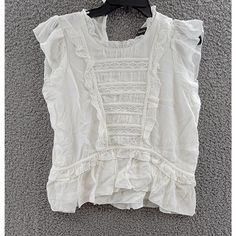 Aqua Lace Inset Ruffled Flutter Sleeve Top Shirt Women'S M White Round Neckline Aqua Lace Inset Ruffled Flutter Sleeve Top Shirt Women's M White Round Neckline Retail $78.00 Introducing A Beautiful White Top From Aqua - Perfect For Any Casual Occasion. This Blouse Has A Round Neckline, Flutter Sleeves, And A Flattering Strap Type, Making It A Great Addition To Your Wardrobe. The Shirt Is Made Of Breathable And Comfortable Rayon Material, Making It Suitable For Wear During Summer, Fall, And Summer Ruffle Top With Flutter Sleeves, Summer Tops With Ruffles And Flutter Sleeves, Summer Tops With Ruffle Hem And Ruffled Collar, Summer Tops With Ruffled Collar And Hem, Summer Ruffle Sleeve Tops With Lace Trim, White Ruffled Flutter Sleeve Tops, Summer Tops With Lace Trim And Ruffle Sleeves, Summer Tops With Lace Trim And Ruffled Collar, White Ruffle Sleeve Top For Daywear