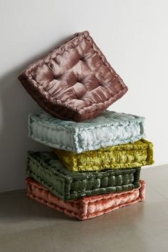 three cushions stacked on top of each other