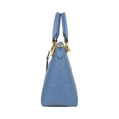 Louis Vuitton 'V Tote BB' handbag in blue monogram empriente leather with cream leather panels and gold hardware. Features double rolled handles and a removable shoulder strap. The bag has a two-way zip closure and blue suede lining wth two slip pockets. Includes dust bag. Brand = Louis Vuitton Condition = 8/10, Very good. light wear to corners, small mark on front of bag, fading to hardware. Dimensions = 10.5" x 4.25" x 7" Strap Drop = 21"-23" Material = Leather SKU = 13406-111 Evening Monogram Canvas Top Handle Satchel, Monogram Canvas Top Handle Satchel For Evening, Top Handle Monogram Canvas Satchel With Branded Hardware, Blue Top Handle Bags For Everyday Luxury, Luxury Blue Bag With Round Handle, Blue Monogram Canvas Shoulder Bag With Branded Hardware, Luxury Blue Bags With Round Handle, High-end Blue Bag With Detachable Handle, High-end Blue Bag With Double Handle