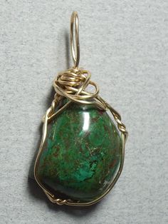 This rich and attractive stone combines earth colors of green, blue-green, and brown in a swirled mottled pattern. Best worn with blue, green, and brown, also beautiful with black; this stone is, howe Green Tumbled Natural Stone Jewelry, Green Jasper Spiritual Jewelry, Green Tumbled Spiritual Jewelry, Spiritual Tumbled Green Jewelry, Green Jasper Jewelry With Natural Stones, Green Chrysocolla Pendant Jewelry, Distinctive Green Jasper Jewelry, Handmade Green Jasper Jewelry, Green Large Stone Gemstones For Healing