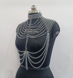 Chainmail Shoulder Jewelry Aluminum Medieval Halter Top, Rave outfit, Festival Gift, Collared Neck Front Fringed Top, Ren faire Costume Product Details Material : Aluminum Ring Diameter : 09mm 16 Gauge Ring type : Butted Rings Color Silver Finish : Anodized  Closure : Lobster back closure You can also share your costume size All Size And All Gauge are available This excellent chainmail is 100% Hand Crafted. This chainmail features a traditional 4-in-1 woven ring pattern. If you have any questions please write to me. Thanks If You Can Not Find Your Favorite Item In My Shop , You Could Also Send Me The Picture Or Linking Of Which You'd Like. We Can Make The Item According To That. We Make A Promise That We Will Use The Best Material For The Item. Shipping: All ordered items shipped within 8- Chainmail Jewelry Patterns, Chainmail Headpiece, Chainmail Clothing, Chainmail Top, Ren Faire Costume, Shoulder Jewelry, Ring Pattern, Outfit Festival, Front Fringe