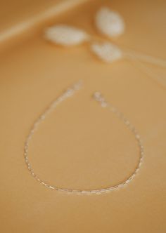 For the true minimalist. Delicate rectangle chain links create a simple but unique look. Available in 8.5-9" and 9.5-10". Available in 14kt Gold Fill + Sterling Silver. Shown with our Harlow Anklet. Handmade in Eau Claire, WI. Our jewelry is handmade so each piece will be unique and may vary slightly from what is pictured. Minimalist Adjustable Chain Anklet, Minimalist 14k Gold-filled Delicate Chain Bracelet, Delicate Gold Anklet With Adjustable Chain, Skin-friendly Gold Minimalist Anklet, Elegant Adjustable 14k Gold-filled Anklets, Copper Uses, Everyday Wear Jewelry, Adornment Jewelry, Jewelry Cleaner