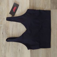 Size: S Shoulder To Hem: 15.5" Pit To Pit: 14.5" Condition: Nwt, No Rips, No Stains, From Smoke Free Home. Flat Lay Measurements. Ships Within 24 Hrs Except Weekends! I Love Offers! Black Stretch Crop Top With Built-in Bra, Black Stretch Tank Top With Built-in Padding, Black Sports Tank Top With Built-in Padding, High Stretch Tops With Built-in Padding For Gym, Casual Racerback Tops With Built-in Padding, Stretch Black Crop Top With Built-in Bra, Black Athleisure Tank Top With Built-in Padding, High Stretch T-back Tops For Sports, Casual Black T-back Activewear