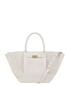 Demellier Midi New York Bag in Off White Magnetic closure Dual top handles Adjustable crossbody strap Belted gold detail Triangular folds on each side Metal feet Internal zip and slip pockets Leather outer Cotton lining 19”W x 8.7”H x 5.9”D 4.7” handle drop 19.3” strap drop Structured Bag With Gold-tone Hardware, Structured Travel Bag With Gold-tone Hardware, Structured Shoulder Bag With Gold-tone Hardware For Work, Timeless Crossbody Shoulder Bag With Handles, Modern Gold Structured Bag, Structured Bag With Gold-tone Hardware For Daily Use, Structured Bags With Gold-tone Hardware For Daily Use, Gold Top Handle Satchel For Work, Elegant Bucket Bag With Detachable Strap And Double Handle