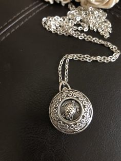 "🔸🔸orders are delayed by a few days this week. Thank you for your patience Sea turtle locket, ocean jewelry, turtle gift This antiqued silver locket has been adorned with an antiqued silver sea turtle setting inside a detailed antiqued silver bezel. This small folding spring locket is 1\" and can hold four small 3/4\" photos and hangs from 20\" of antiqued silver textured rhodium chain and lobster clasp. You can also purchase additional chain by the inch for a longer necklace during checkout. Spiritual Turtle-shaped Jewelry Gift, Spiritual Turtle Shaped Jewelry Gift, Silver Turtle Necklace For Gift, Silver Turtle Jewelry For Gifts, Silver Turtle Jewelry Gift, Nickel-free Silver Turtle Jewelry, Antique Silver Coin Pendant Jewelry As Gift, Antique Silver Adjustable Locket Jewelry, Antique Silver Medallion Jewelry For Keepsake