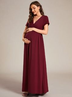 This stunning pleated V-neck maternity dress is the perfect way to showcase your growing bump. The soft and stretchy fabric hugs your curves in all the right places, while the pleated design adds a touch of elegance and sophistication. Wear it to your next baby shower or special event and be the envy of all your friends. Elegant Maternity Dress Nursing Friendly, Elegant Nursing-friendly Maternity Dress, Elegant Short Sleeve Maternity Dress Bump Friendly, Maternity V-neck Ruched Dress, Elegant Flowy Maternity Dress, Flowy V-neck Maternity Maxi Dress, Flowy V-neck Maxi Dress For Maternity, Nursing Friendly Maternity Dress With Empire Waist, Nursing Friendly Empire Waist Maternity Dress