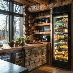 a kitchen filled with lots of food next to a large glass door freezer oven