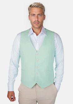 Wow the crowd in the Mint Green Linen Vest! Custom made from a breathable linen cotton blend, this pastel mint green piece will have you turning heads at any event! Step up your style game with this unique and classy suit. You can't go wrong! Tailored Spring Cotton Suits, Summer Cotton Workwear Suits, Green Cotton Formal Suits, Green Cotton Suits For Formal Occasions, White Cotton Summer Suit, Summer Formal Cotton Suits, White Cotton Suit For Spring, Green Tailored Casual Suit, Casual Tailored Green Suit