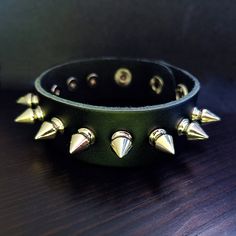 This is a Punk Silver Spike Bracelet. It's a gift for men or women. This will be a perfect gift for your friends. This product is handmade and takes 1 day to make. It will be shipped as soon as possible on the next day. If you have any questions, please contact us with Etsy message. Free Shipping Over $35. All orders have tracking number. Thank you so much : ) Punk Black Bracelets With Spikes, Black Punk Bracelets With Studs, Punk Black Bracelets With Studs, Black Spiked Festival Bracelets, Black Spiked Bracelets For Festival, Black Festival Bracelets With Spikes, Black Rock Style Bracelet For Gift, Black Studded Bracelets For Party, Black Rock Style Wristband As Gift