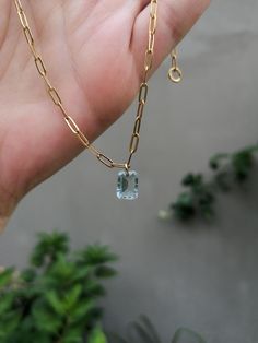 Step cut aquamarine as a charm on dainty paperclip chain Choose your necklace lenght:  40 cm =16" 45 cm = 18" The gemstone size is 8x 6 mm (= 1/3" x 1/5") Made from PVD gold plated stainless steel - sweatproof/ waterproof gold plating, you can wear your jewelry every day and it will remains gold -> or silver stainless steel Aquamarine is birthstone of the month March You will recieve your jewelry nicely packed in our brand box - ready to be gifted or to be stored in Aquamarine Jewelry Necklace, March Birthstone Jewelry, Aquamarine Jewelry, Step Cut, March Birthstone, Trombone, March Birth Stone, Birthstone Jewelry, Paper Clip