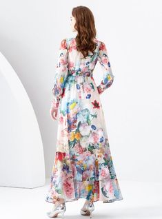 "Bursting with the vivid splendor of a blooming garden, this exquisite maxi dress is a sartorial tribute to the rejuvenating spirit of spring. A masterpiece draped in delicate chiffon, it features a full-length cascade of floral prints, as if a painter's wild brushstrokes have come to life on fabric. The plunging V-neckline and cinched waist offer a figure-flattering silhouette, balanced by long, sheer sleeves that whisper of elegance. Perfect for the woman who commands the room with her grace and poise, this dress is an ideal choice for upscale garden parties or whimsical outdoor weddings. It's not just a statement piece, but a wearable fantasy, promising to turn heads and capture hearts." Fabric name: chiffonPattern: printingSkirt length: medium and long skirtSleeve length: long sleevesC Printing Skirt, Floral Palette, Blooming Garden, Sleeveless Dresses Casual, Push Up Swimsuit, Printed Tankini, Outdoor Weddings, Garden Parties, Pink Midi Dress