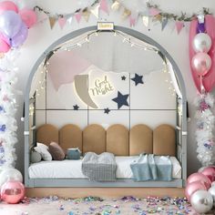 a room decorated with balloons, stars and confetti