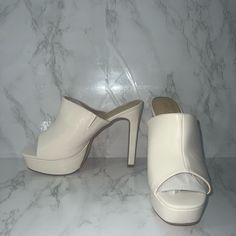 Size 10 Off White Classic White Sandals With 4-inch Heel, White Sandals With 4-inch Heel For Spring, White Platform Heels In Trendy Style, White Synthetic Closed Toe Heels, White Synthetic Closed-toe Heels, Classic White Round Toe Heels, Casual White Platform Heels, Casual White Heels For Spring, Classic Platform Heels In Synthetic Material