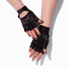 Fingerless gloves add an edgy vibe to any outfit, dressy or casual! These feature a shiny satin-like texture and a snap closure. Pack Size: 1 Pair One size Closure: Snap Material: Polyester - Claire's Black Satin Fingerless Gloves Leather Fingerless Gloves Aesthetic, Emo Fingerless Gloves, Y2k Fingerless Gloves, Black Fingerless Gloves Aesthetic, Edgy Gloves, Cyberpunk Gloves, Black Gloves Aesthetic