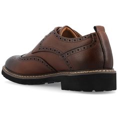 Introducing the Campbell wingtip derby by Vance Co. These professional-style shoes are crafted with premium vegan leather for a business-savvy look. Featuring a 12 mm Tru Comfort Foam™ insole and a lace-up design, they provide all-day comfort and a customizable fit. With a 1-1/4 inch block heel, round-toe shape, and padded tongue for extra comfort, the Campbell wingtip derby combines classic elegance with modern convenience, making it the perfect choice for the office or any professional setting Business Savvy, Professional Style, Closed Toe Shoes, Round Toe Heels, Professional Fashion, Classic Elegance, Lace Up Shoes, The Office, Derby