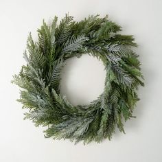 a green wreath hanging on the wall