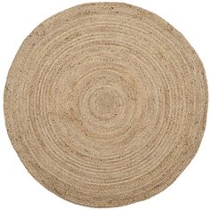 the round rug is made from jute and has been placed on top of a white background