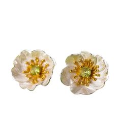 "Embrace the enchanting allure of poppy flowers with our sterling silver and gold stud earrings, each adorned with a vibrant gemstone center in your choice of blue topaz, garnet, peridot, or amethyst. 🌺💎 Crafted with meticulous detail, these earrings capture the delicate beauty of poppies in bloom, symbolizing beauty, remembrance, and vitality. Add a touch of elegance and personal flair to your ensemble with these exquisite studs, perfect for expressing your unique style and personality." 🌿✨ Yellow Gold Flower Jewelry With Matching Earrings, Nature-inspired Flower Gemstone Jewelry, Hallmarked Sterling Silver Flower Earrings Gift, Handmade Sterling Silver Petal Jewelry, Sterling Silver Flower Earrings For Anniversary, Sterling Silver Flower Earrings Fine Jewelry, Yellow Gold Flower Jewelry For May Birthstone, Yellow Gold Sterling Silver Flower Earrings, Sterling Silver Birth Flower Earrings For Anniversary