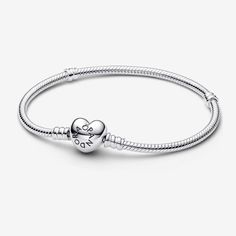 Set your heart a-flutter with this romantic version of Pandora's bestselling charm bracelet. Hand-finished with a heart-shaped clasp, this sterling silver snake chain bracelet looks stunning on its own but even better adorned with your favorite Pandora charms and clips. Layer it with contrasting Pandora chain bracelets for a chic, multi-layered look. - Pandora Moments Heart Clasp Snake Chain Bracelet - Sterling silver - Sz. 8.3 in Pandora Heart Bracelet, Pandora Chain Bracelet, Silver Pandora Bracelet, Basic Bracelet, Pandora Heart, Charms Pandora, Bracelet Pandora, Pandora Hearts, Gold Armband