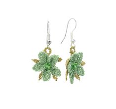 Celebrate the triumph of life and nature's renewal with our Persephone Earrings. Each pair of earrings is inspired by Turkey's native Glory of the Snow flowers, whose star-shaped buds are the first to usher in the warmth of spring each year. Colorful and vibrant, pair your earrings with a Persephone necklace and bracelets to craft a set that honors nature's beauty year-round! Nature-inspired Drop Flower Earrings For Pierced Ears, Green Flower-shaped Pierced Earrings, Adjustable Flower-shaped Nature-inspired Earrings, Green Drop Flower Earrings, Nature-inspired Adjustable Flower Earrings, Nature-inspired Green Dangle Flower Earrings, Green Flower Drop Earrings, Gift Single Green Flower Earring, Gift Green Single Flower Earring