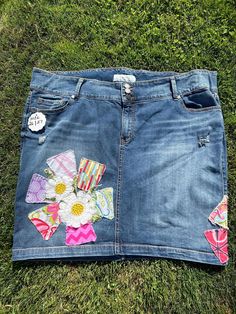 This super cute one of kind stretchy jean skirt has the cutest vintage flower look front and side. This upcycled denim skirt Torrid brand / distress look is so cute for summer or add some tights and boots for fall.Size 26 woman's Cute Fitted Denim Skirt, Spring Stretch Patchwork Skirt, Upcycled Cotton Denim Skirt For Summer, Casual Upcycled Spring Skirt, Casual Denim Skirt Upcycled, Casual Upcycled Skirt For Spring, Casual Fitted Upcycled Denim Skirt, Casual Upcycled Denim Skirt, Cute Denim Skirt For Spring