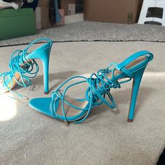 New , Never Worn. Long Straps You Can Tie Around The Ankles. Blue Strappy Sandals For Evening, Blue Strappy Evening Sandals, Trendy Blue Strappy Sandals, Light Blue High Heels For The Beach, Blue Round Toe Lace-up Sandals, Turquoise Ankle Strap Heels For Summer, Summer Turquoise Ankle Strap Heels, Chic Turquoise Open Toe Sandals, Chic Turquoise Sandals For Summer