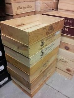 several wooden boxes stacked on top of each other