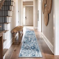 the hallway is clean and ready for us to use as an entrance way in this home