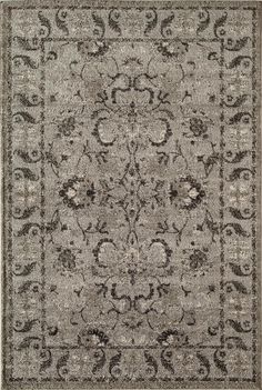 a gray and black rug with an ornate design