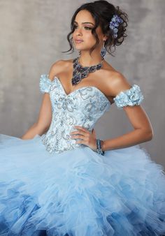 You are princess for an evening in this beautiful design from Vizcaya by Mori Lee 89161. The fitted bodice is intricately designed with jewel bead embellishments framed with a sweetheart neckline, complemented with a mid-open laced up back. From the basque waist leads to the ruffled tulle ballgown skirt. Set includes a matching stole and detachable arm cuffs with 3D floral appliques. Walk the red carpet in style wearing this stunning Vizcaya by Mori Lee masterpiece. Style: mori_89161 Details: Be Mori Lee Quinceanera Dresses, Ombre Dress, Lace Prom Dress, Quinceanera Dress, Ball Gown Skirt, Mori Lee, Dress Sketches, Beaded Bodice, Quince Dresses