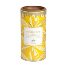 a yellow tin with an orange and white design on the lid that says banoffee pie