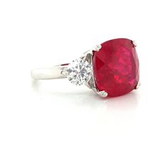 GORGEOUS VINTAGE 14K WHITE GOLD ENGAGEMENT RUBY RING CENTER LAB GROWN RUBY IN CUSHION SHAPE WEIGHT 9.23CARAT size 12x12MM GORGEOUS GEMSTONE RED RUBY IN CUSHION SHAPE. VERY NICE CUT ,LIVELY STONE.CLEAN ,GORGEOUS COLOR ,VERY BRILLIANT AND SPARKLY. SIDE SET TWO ROUND NATURAL DIAMONDS WEIGHT 1.37CT SIZE 5.7MM H-SI1 SPARKLY DIAMONDS LIVELY BRILLIANT, NICE CUT WHITE BRIGHT STONES. RING size 7 RESIZABLE Retail value $7,500 net. Appraisal available Red Diamond Ring With Brilliant Cushion Cut, Red Cushion Cut Brilliant Diamond Ring, Red Cushion Cut Diamond Ring With Brilliant Cut, Luxury Gia Certified Cushion Cut Ruby Ring, Gia Certified Cushion Cut Ruby Ring For Formal Occasions, Formal Gia Certified Cushion Cut Ruby Ring, Cushion Cut Diamond Ring With Accent Stones In Platinum, Cushion Cut Platinum Diamond Ring With Accent Stones, Platinum Cushion Cut Diamond Ring With Accent Stones