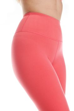 Step up your workout game with our Interlock Jersey High Waist Compression Leggings with V-Shape Waistband. Made with a soft yet durable interlock jersey fabric, these leggings offer both comfort and support. The high-waist design provides tummy control and the v-shape waistband creates a flattering silhouette, making these leggings perfect for all body types. Available in a beautiful camelia rose color. Product Features: Interlock jersey fabric High Waist V-Shape Waistband Compression Fit Model Squat Proof Elastane Sports Tights, Squat Proof Elastane Tights For Sports, Squat Proof Sports Tights, Sportswear Yoga Tights Sweat Resistant, Moisture-wicking Sportswear Tights For Yoga, Pink Breathable Elastane Activewear, Micro-elastic Sweat Resistant Leggings For Yoga, Moisture-wicking Yoga Leggings, Sporty Sweat-resistant Yoga Tights