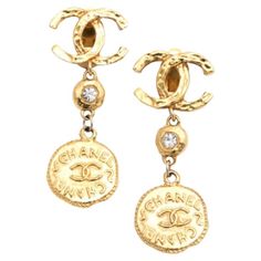 Beautiful vintage Chanel long coin dangling earrings with the iconic CC and rhinestones. Specifications: Height: 2.6, Width: 1.1 inches Gucci Bracelet, Orange Earrings, Coin Earrings, Diamond Jewelry Designs, Chanel Earrings, Fire Fits, Fashion Life, Chanel Jewelry, Fabulous Jewelry