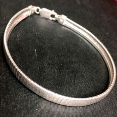 New Solid Sterling 925 Silver Italian Omega Link Women Bracelet Style : Omega Link Bracelet Metal Type : Anti Tarnish .925 Sterling Silver Approx. Length : 8" Inches Approx. Width : 0.23" Inches ( 6 Mm ) Approx. Thickest : 0.07" Inches ( 1.8 Mm ) Approx. Weight : 12 Grams To 13 Grams Region Imported From: Italy Clasp : Lobster Clasp Item # : Jn10051702-Shop-751-Bb Omega Bracelet, Bracelet Metal, Bracelet Style, Women Bracelet, Metal Bracelets, Womens Jewelry Bracelets, Link Bracelets, Fashion Bracelets, Womens Bracelets