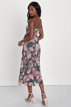 Stroll into the party with confidence, 'cause no on will be able to match your look in the Lulus Delightfully Divine Navy Blue Floral Chiffon Wrap Midi Dress! Airy woven chiffon, with a romantic floral print throughout, falls from adjustable spaghetti straps to form a surplice bodice with long sash ties that thread and secure around the waist. Skirt has an overlapping silhouette and falls to a flirty midi hem. Fit: This garment fits true to size. Length: Mid-calf length. Size medium measures 44. Flowy Floral Print Chiffon Party Dress, Flowy Floral Chiffon Party Dress, Blue Chiffon Dress For Summer Wedding, Blue Chiffon Dress For Summer Wedding Guest, Dressy Floral Print Midi Dress For Party, Summer Dressy Chiffon Party Dress, Floral Print Chiffon Dress For Date Night, Feminine Floral Print Chiffon Party Dress, Feminine Chiffon Midi Dress For Party