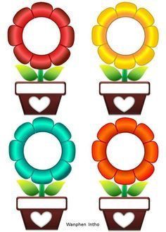 four flower pots with flowers in them and the number three on each one, which has been