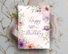 a greeting card with flowers and the words happy 50th birthday