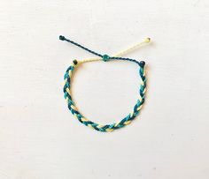 This fun bracelet is waterproof and great for anyone who is often doing outdoor activities. It would make a nice gift. Stack it with other bracelets, or wear it by itself! It is perfect for everyday wear! ∙ ∙ ∙ ∙ ∙ ∙ ∙ ∙ ∙ ∙ ∙ ∙ ◆ PLEASE NOTE ◆ When you first receive this bracelet it may be slightly sticky, which may make it more difficult to adjust. The stickiness does not last. After a day or two of wearing the stickiness will fade and it will be much easier to adjust. It will still be waterpr Casual Adjustable Yellow Braided Bracelets, Casual Yellow Friendship Bracelets With Adjustable Cord, Resizable Yellow Friendship Bracelets, Adjustable Cord Yellow Bracelet For Beach, Green Nylon Cord Bracelets For The Beach, Green Nylon Cord Beach Bracelets, Casual Yellow Friendship Bracelets With Sliding Knot, Yellow Adjustable Friendship Bracelets For Beach, Resizable Yellow Friendship Bracelets For The Beach