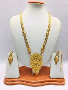 Handmade Indian Jewelry Asian Wedding Bridal Jewellery Party Ethnic Wear 22ct Gold Plated Bridal Necklace Set Rani Haar Bridal Jewellery Set  PLEASE NOTE, This Item Is Not Real Gold .Only Good Quality Gold Plated Jewellery .it is Artificial jewellery. It is a perfect match with formal attire on special occasions or with casual wearing.  Slight Colour variations possible due to difference in screen and photograph Care instructions Keep Jewellery away from direct heat, water, perfumes, deodorants Gold Bridal Sets With Pallu For Traditional Ceremonies, Gold Bridal Necklace For Puja With Intricate Design, Gold Bridal Necklace With Intricate Design For Puja, Gold Traditional Wear For Festivals And Ceremonies, Gold Jewelry With Zari Work For Traditional Ceremonies, Gold Kundan Necklace For Traditional Ceremonies And Festive Season, Gold Kundan Necklace With Meenakari For Traditional Ceremonies, Gold Chandbali Bridal Necklace For Traditional Ceremonies, Gold Bollywood Bridal Necklace For Traditional Ceremonies