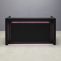 a black table with a purple light on the top and bottom shelf in front of it