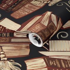 a wallpaper with books and tassels on it