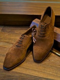 "Elevate your formal attire with our Bespoke Men's Brown Suede Leather Lace-up Oxford Shoes. Meticulously crafted to perfection, these shoes are a testament to both style and sophistication. The rich brown suede leather exudes luxury, while the lace-up Oxford design adds a touch of timeless elegance. Whether you're attending a business meeting or a special occasion, these bespoke shoes are sure to make a statement. Handmade with attention to detail, they offer unparalleled comfort and durability. Step into refined style with every stride. #MensFashion #BespokeShoes #OxfordShoes #FormalWear #SuedeLeather #Handmade #DressShoes" Cap Toe Shoes, Shoes Stylish, Bespoke Shoes, Leather Dress Shoes, Leather Shoes Men, Up Shoes, Gray Suede, Stylish Shoes, Formal Shoes