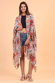 Our kimono features a back cut-out detail with a floral paisley pattern. It features a lightweight and breathable fabric to ensure comfort. Style over your favorite swimsuit for a stylish beach cover-up. Multicolor Boho Print Free Size Kimono, Multicolor Boho Print Free-size Kimono, Multicolor Free Size Boho Print Kimono, Casual Patterned Kimono For Beach Cover-up, Bohemian Multicolor Patterned Kimono, Multicolor Printed Kimono For Beach Cover-up, Bohemian Patterned Multicolor Kimono, Summer Kimono With Abstract Print, Multicolor Free Size Kimono