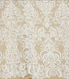 "White /Cappuccino Wedding embroidered lace fabric Ivory bridal sequin tulle fabric Geometric embroidery Sequin Lace fabric for sewing dress / Width 53 Use the special price for 5 yards Ask please! 1)Cappuccino 2)Ivory 3)White Width 53\" Length 0.5 yard 1 yard Effect: embroidery Geometric sequins fabric Basis: Tulle Embroidery on the lace \"Geometric pattern \" - beautiful and high-quality embroidery of lace fabric . Application: Suitable for tailoring wedding and evening dresses. Also suitable Wedding Sequin Lace Fabric With Lace Patchwork, Elegant Beige Lace Tulle Fabric, Elegant Cream Lace Tulle Fabric, Elegant Cream Lace Fabric And Notions, Cream Tulle Fabric With Intricate Embroidery For Wedding, Wedding Tulle Fabric In Cream With Intricate Embroidery, Cream Wedding Tulle Fabric With Intricate Embroidery, Wedding Cream Tulle Fabric With Intricate Embroidery, Elegant Cream Tulle Fabric For Ceremony